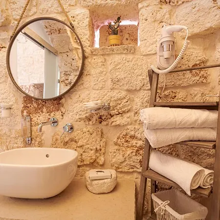 Relais Il Trullo Della Rupe بيت ضيافة أوستوني